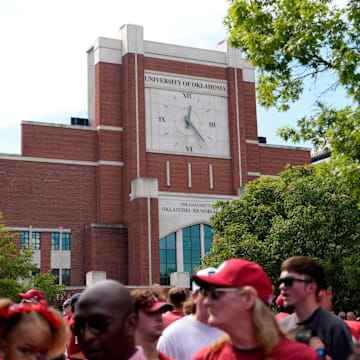 Fans gather outside Gaylord Family-Oklahoma Memorial Stadium ahead of the Sooners' matchup with Auburn.