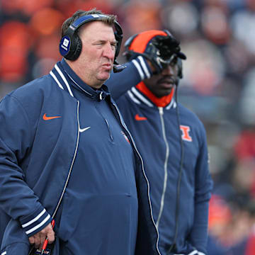 Nov 23, 2024; Piscataway, New Jersey, USA; Illinois Fighting Illini head coach Bret Bielema looks on during the second half against the Rutgers Scarlet Knights at SHI Stadium. Mandatory Credit: Vincent Carchietta-Imagn Images