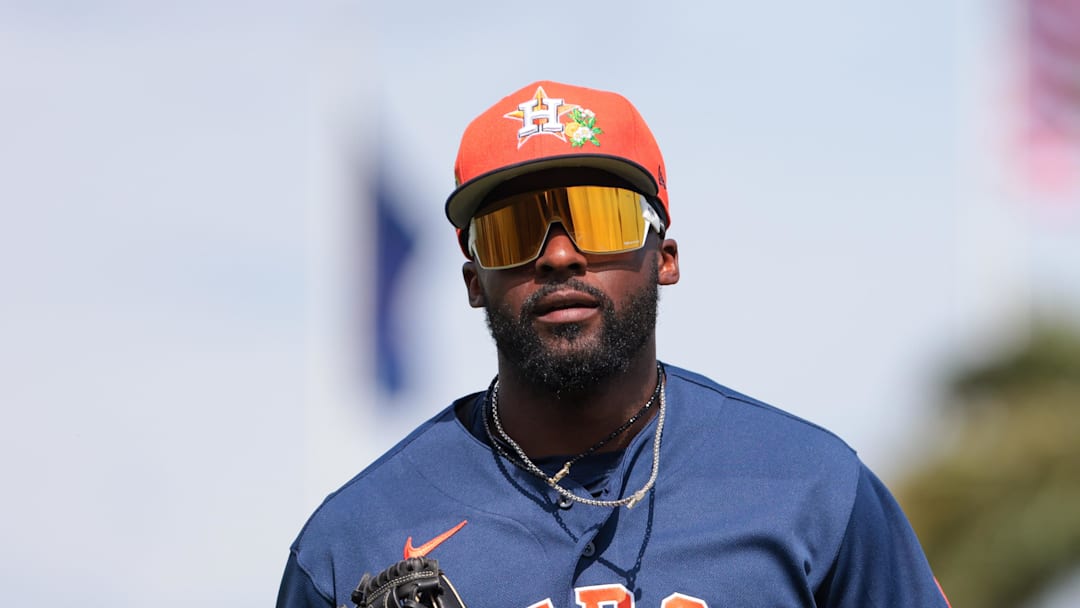 Feb 22, 2026; West Palm Beach, Florida, USA; Houston Astros left fielder Taylor Trammell (26) returns to the dugout against the St. Louis Cardinals during the fourth inning at CACTI Park of the Palm Beaches. Mandatory Credit: Sam Navarro-Imagn Images