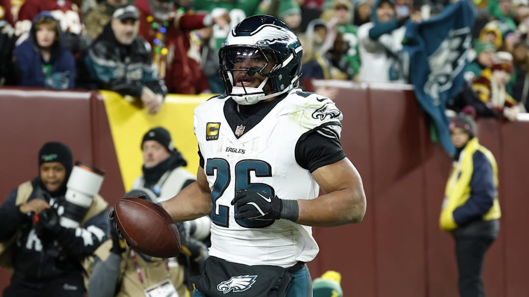 Eagles running back Saquon Barkley rushed for 132 yards and a touchdown in Philadelphia's NFC East-clinching win over the Commanders on Saturday.
