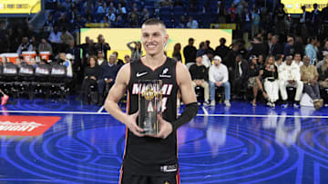 Feb 15, 2025; San Francisco, CA, USA; Miami Heat guard Tyler Herro (14) celebrates with the trophy after winning the three-point contest during All Star Saturday Night ahead of the 2025 NBA All Star Game at Chase Center. Mandatory Credit: Kyle Terada-Imagn Images