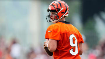 Jul 27, 2023; Cincinnati, Ohio, USA; Cincinnati Bengals quarterback Joe Burrow (9) drops back to pass during training camp practice at the practice fields beside Paycor Stadium.  Mandatory Credit: Kareem Elgazzar/The Cincinnati Enquirer-USA TODAY Sports