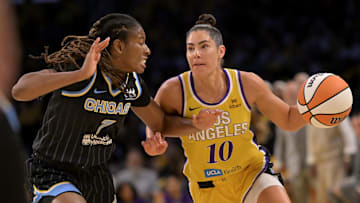 Jun 29, 2025; Los Angeles, California, USA; Los Angeles Sparks guard Kelsey Plum (10) drives past Chicago Sky guard Ariel Atkins (7) in the first half at Crypto.com Arena. Mandatory Credit: Jayne Kamin-Oncea-Imagn Images