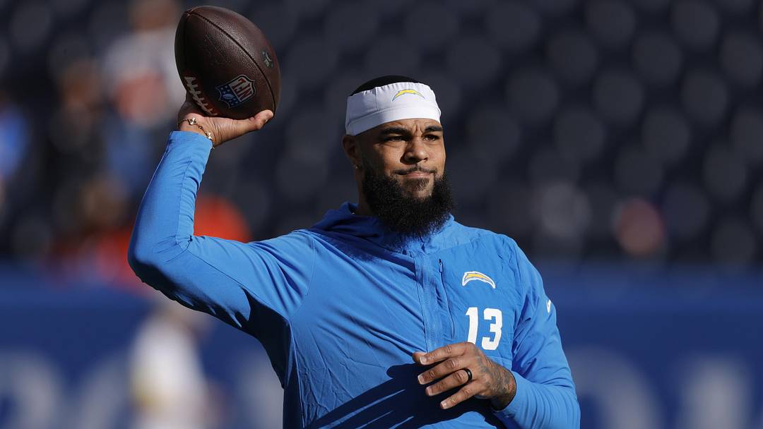 Jan 4, 2026; Denver, Colorado, USA; Los Angeles Chargers wide receiver Keenan Allen (13) warms up before the game against the Denver Broncos at Empower Field at Mile High. Mandatory Credit: Isaiah J. Downing-Imagn Images