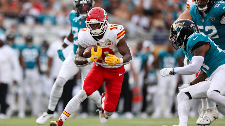 Aug 10, 2024; Jacksonville, Florida, USA; Kansas City Chiefs running back Isiah Pacheco (10) runs with the ball against the Jacksonville Jaguars in the first quarter during preseason at EverBank Stadium. Mandatory Credit: Nathan Ray Seebeck-Imagn Images