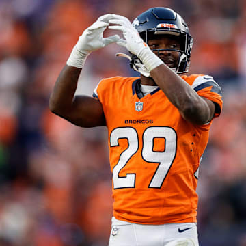 Dec 15, 2024; Denver, Colorado, USA; Denver Broncos cornerback Ja'Quan McMillian (29) gestures in the third quarter against the Indianapolis Colts at Empower Field at Mile High. Mandatory Credit: Isaiah J. Downing-Imagn Images
