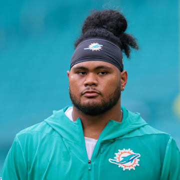 Miami Dolphins guard Jonah Savaiinaea (72) looks on before the game against the Jacksonville Jaguars at Hard Rock Stadium. 