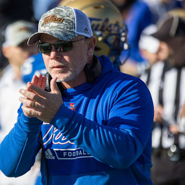 Virginia Tech has hired former Tulsa head coach Philip Montgomery as the school's new offensive coordinator.