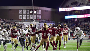 Nov 15, 2025; Chestnut Hill, Massachusetts, USA; Boston College Eagles running back Jordan McDonald (5) runs with the ball for a touchdown during the second half against the Georgia Tech Yellow Jackets at Alumni Stadium. Mandatory Credit: Bob DeChiara-Imagn Images
