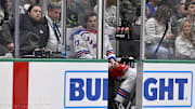 Dec 20, 2024; Dallas, Texas, USA; New York Rangers center Matt Rempe (73) sits in the penalty box after receiving a penalty for an elbow on Dallas Stars defenseman Miro Heiskanen (not pictured) during the third period at the American Airlines Center. Mandatory Credit: Jerome Miron-Imagn Images