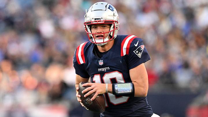 Nov 17, 2024; Foxborough, Massachusetts, USA; New England Patriots quarterback Drake Maye (10) runs with the ball against the Los Angeles Rams during the second half at Gillette Stadium. Mandatory Credit: Brian Fluharty-Imagn Images