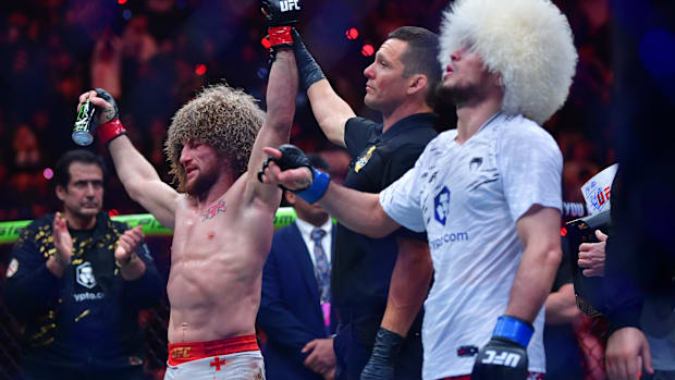 Merab Dvalishvili celebrates defeating Umar Nurmagomedov
