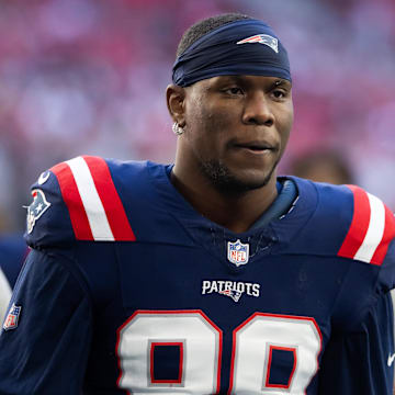 Dec 15, 2024; Glendale, Arizona, USA; New England Patriots defensive end Keion White (99) against the Arizona Cardinals at State Farm Stadium. Mandatory Credit: Mark J. Rebilas-Imagn Images