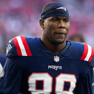 Dec 15, 2024; Glendale, Arizona, USA; New England Patriots defensive end Keion White (99) against the Arizona Cardinals at State Farm Stadium. Mandatory Credit: Mark J. Rebilas-Imagn Images