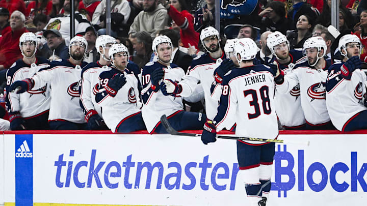 Mar 2, 2024; Chicago, Illinois, USA;  Columbus Blue Jackets center Boone Jenner (38) celebrates his goal against the Chicago Blackhawks with teammates during the first period at the  United Center. Mandatory Credit: Matt Marton-Imagn Images