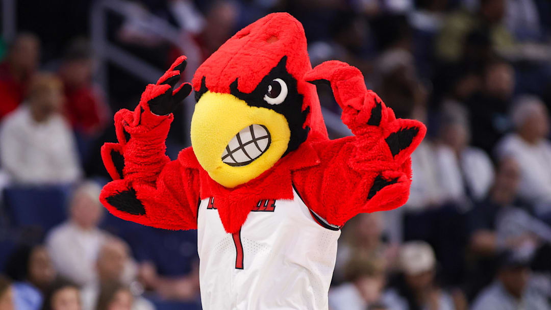 Mar 7, 2026; Duluth, GA, USA; Louisville Cardinals mascot Louie on the court against the North Carolina Tar Heels in the second quarter at Gas South Arena. Mandatory Credit: Brett Davis-Imagn Images