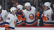 Oct 9, 2025; Pittsburgh, Pennsylvania, USA;  New York Islanders left wing Jonathan Drouin (29) celebrates his goal with teammates against the Pittsburgh Penguins during the first period at PPG Paints Arena. Mandatory Credit: Charles LeClaire-Imagn Images