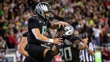 Oregon Ducks quarterback Dillon Gabriel and Oregon Ducks running back Jordan James celebrate a touchdown by Gabriel as the No. 3 Oregon Ducks host the No. 2 Ohio State Buckeyes Saturday, Oct. 12, 2024 at Autzen Stadium in Eugene, Ore.
