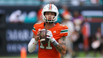 Miami Hurricanes quarterback Carson Beck (11) warms up before a game against the South Florida Bulls at Hard Rock Stadium.