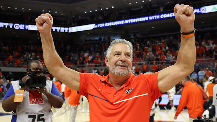 Feb 22, 2025; Auburn, Alabama, USA; Auburn Tigers head coach Bruce Pearl celebrates the win after the game against the Georgia Bulldogs at Neville Arena. Mandatory Credit: John Reed-Imagn Images