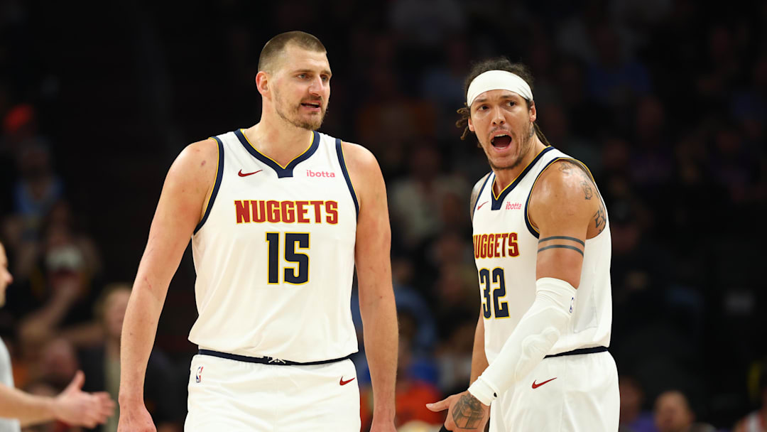 Mar 24, 2026; Phoenix, Arizona, USA; Denver Nuggets center Nikola Jokic (15) and forward Aaron Gordon (32) against the Phoenix Suns at Mortgage Matchup Center.