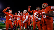 Nov 22, 2025; Colorado Springs, Colorado, USA; New Mexico Lobos players celebrate after the game against the Air Force Falcons at Falcon Stadium. Mandatory Credit: Isaiah J. Downing-Imagn Images
