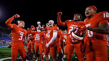 Nov 22, 2025; Colorado Springs, Colorado, USA; New Mexico Lobos players celebrate after the game against the Air Force Falcons at Falcon Stadium. Mandatory Credit: Isaiah J. Downing-Imagn Images