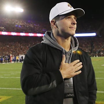 Former Iowa State and San Francisco 49ers quarterback Brock Purdy waves to the crowd as introduced during Iowa State and Kansas football at Jack Trice Stadium on Saturday, Nov. 4, 2023, in Ames, Iowa.