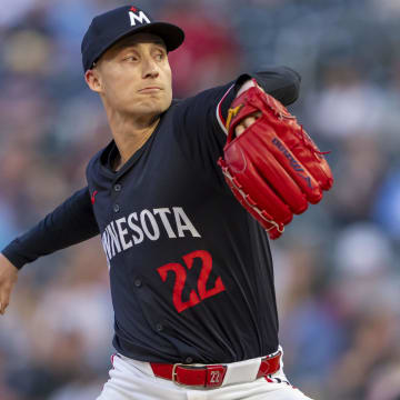 Jun 10, 2024; Minneapolis, Minnesota, USA; Minnesota Twins pitcher Griffin Jax (22) delivers a pitch against the Colorado Rockies in the eighth inning at Target Field. Mandatory Credit: Jesse Johnson-USA TODAY Sports
