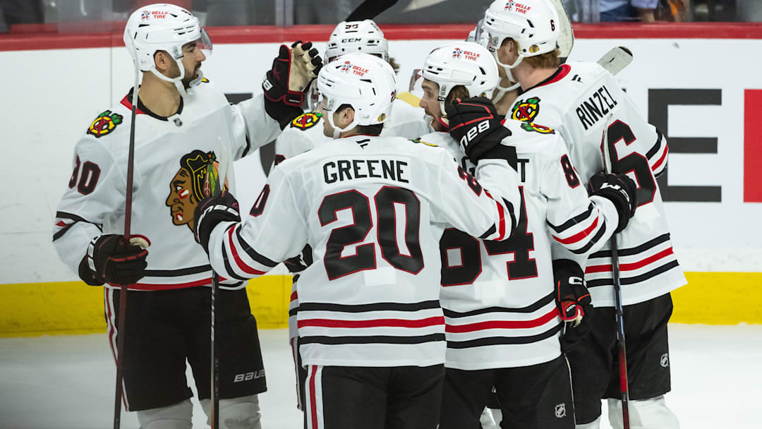 Apr 15, 2025; Ottawa, Ontario, CAN; The Chicago Blackhawks celebrate a goal scored by center Frank Nazar (91) in overtime against the Ottawa Senators at the Canadian Tire Centre. Mandatory Credit: Marc DesRosiers-Imagn Images