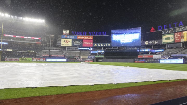 A rain delay is called at Yankee Stadium.