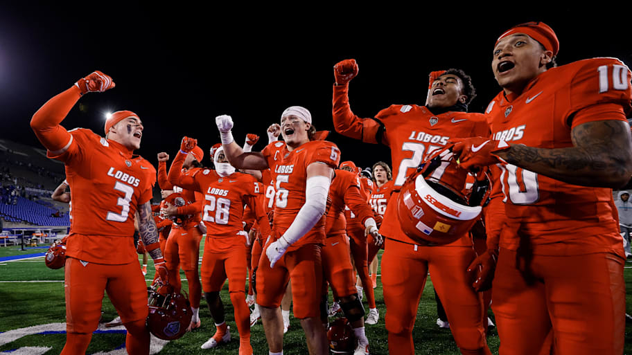 New Mexico players celebrate a win at Air Force.