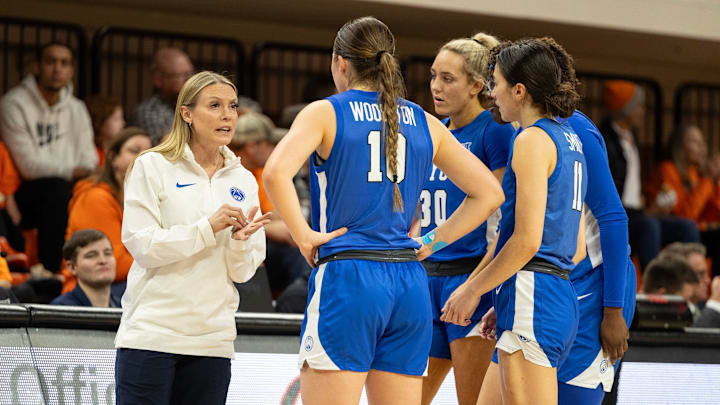 Jan 17, 2024; Stillwater, Okla, USA; BYU Cougars head coach Amber Whiting talks with guard Kailey Woolston (10), guard Kaylee Smiler (11), forward Rose Bubakar (24) and guard Lauren Davenport (30) in the first half of a women s NCAA basketball game against the Oklahoma State Cowgirls at Gallagher Iba Arena. Mandatory Credit: Mitch Alcala-The Oklahoman Jan 17, 2024; Stillwater, Okla, USA; BYU Cougars head coach Amber Whiting talks with guard Kailey Woolston (10), guard Kaylee Smiler (11), forward Rose Bubakar (24) and guard Lauren Davenport (30) in the first half of a women s NCAA basketball game against the Oklahoma State Cowgirls at Gallagher Iba Arena. Mandatory Credit: Mitch Alcala-The Oklahoman