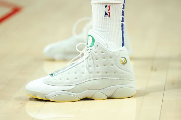 P.J. Tucker's white and green Air Jordan sneakers.