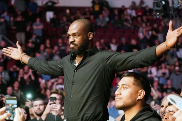 Jon Jones attends the light heavyweight bout between Jan Blachowicz (blue) and Corey Anderson (red) during UFC Fight Night.