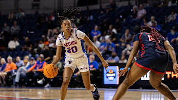 Florida Gators guard Jeriah Warren (20) dribbles the ball against the St. John's Red Storm during the first half at Billy Donovan Court at Stephen C. O'Connell Center in Gainesville, FL on Thursday, March 21, 2024. [Matt Pendleton/Gainesville Sun]