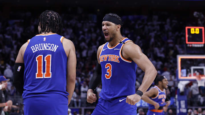 New York Knicks guard Jalen Brunson (11) and guard Josh Hart (3) celebrate after defeating the Detroit Pistons during game six of first round for the 2024 NBA Playoffs at Little Caesars Arena.