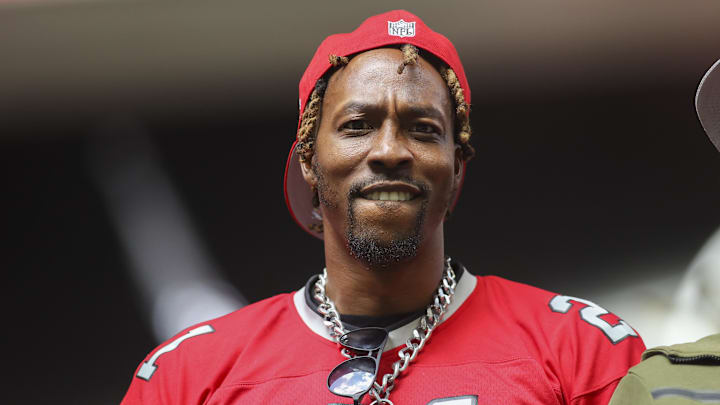 NBA player Dwight Howard watches a game between the Atlanta Falcons and Los Angeles Chargers in the second half at Mercedes-Benz Stadium. NBA player Dwight Howard watches a game between the Atlanta Falcons and Los Angeles Chargers in the second half at Mercedes-Benz Stadium.