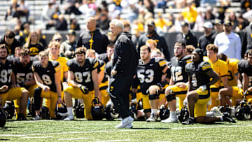 Apr 26, 2025; Iowa City, IA, USA; Iowa head coach Kirk Ferentz talks with players during a spring NCAA football open practice at Kinnick Stadium. Mandatory Credit: Joseph Cress-The Des Moines Register