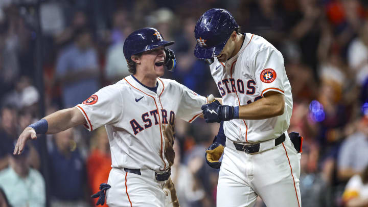 May 16, 2024; Houston, Texas, USA; Houston Astros left fielder Joey Loperfido (10) celebrates with center fielder Jake Meyers (6) after hitting a home run during the third inning against the Oakland Athletics at Minute Maid Park. Mandatory Credit: Troy Taormina-USA TODAY Sports