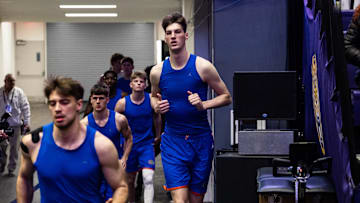 Feb 22, 2025; Baton Rouge, Louisiana, USA; Florida Gators center Olivier Rioux (32) comes out the tunnel with the team against the LSU Tigers during the first half at Pete Maravich Assembly Center. Mandatory Credit: Stephen Lew-Imagn Images