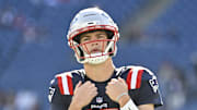 New England Patriots quarterback Drake Maye (10) warms up prior to the game against the Atlanta Falcons
