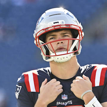 New England Patriots quarterback Drake Maye (10) warms up prior to the game against the Atlanta Falcons