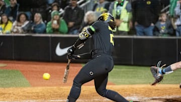 Dezianna Patmon smashed a two-out, two-run single in the first inning to give Oregon a 2-1 lead over Ole Miss in their elimination game at the College World Series.