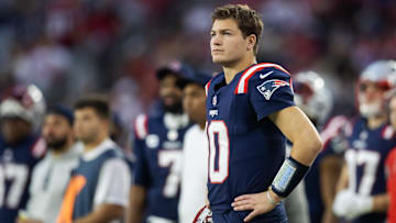 Dec 15, 2024; Glendale, Arizona, USA; New England Patriots quarterback Drake Maye (10) against the Arizona Cardinals in the second half at State Farm Stadium. Mandatory Credit: Mark J. Rebilas-Imagn Images