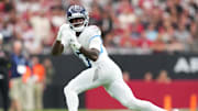 Oct 5, 2025; Glendale, Arizona, USA; Tennessee Titans wide receiver Calvin Ridley (0) makes a catch against the Arizona Cardinals during the second quarter at State Farm Stadium. Mandatory Credit: Joe Camporeale-Imagn Images
