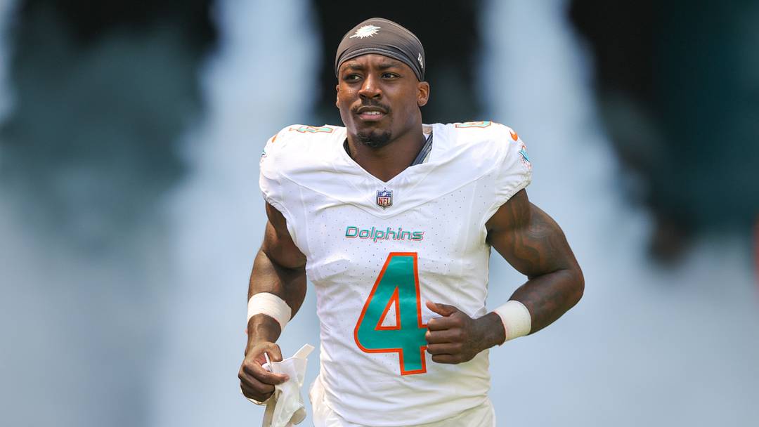 Sep 24, 2023; Miami Gardens, Florida, USA;  Miami Dolphins cornerback Kader Kohou (4) runs onto the field before a game against the Denver Broncos at Hard Rock Stadium. Mandatory Credit: Nathan Ray Seebeck-USA TODAY Sports