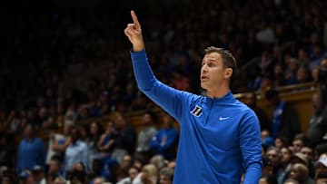Nov 14, 2025; Durham, North Carolina, USA; Duke Blue Devils head coach Jon Scheyer directs his team during the second half against the Indiana State Sycamores at Cameron Indoor Stadium. Mandatory Credit: Rob Kinnan-Imagn Images