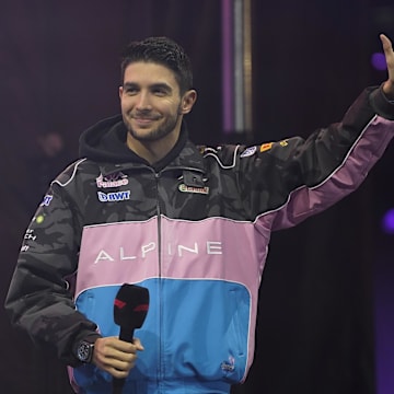 Nov 17, 2023; Las Vegas, Nevada, USA;  BWT Alpine F1 driver Esteban Ocon (31) of France greets fans during opening interviews prior to practice 3 at the Las Vegas Strip Circuit. Mandatory Credit: Lucas Peltier-Imagn Images