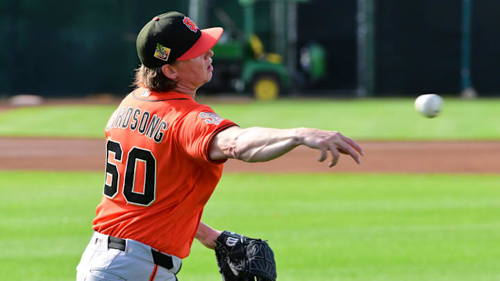 Feb 18, 2026; Scottsdale, AZ, USA; San Francisco Giants pitcher Hayden Birdsong (60) warms up during a Spring Training workout at Scottsdale Stadium Mandatory Credit: Matt Kartozian-Imagn Images
